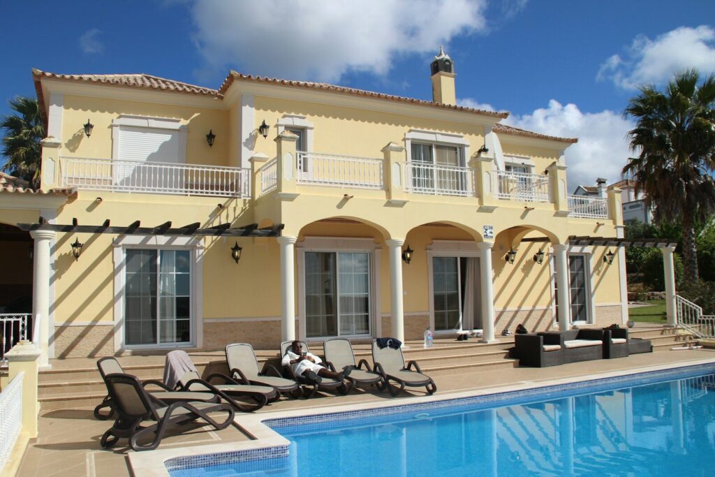 Mediterranean villa exterior with pool
