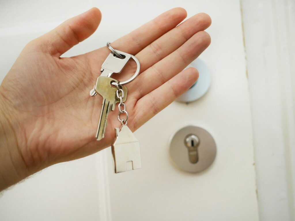 Property manager holding house keys